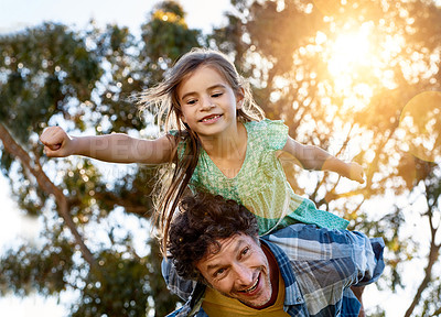 Buy stock photo Piggyback, father and happy girl child outdoor for bonding, support and playing game together in summer. Family, park and dad carrying kid at garden for funny superhero flying, love and low angle