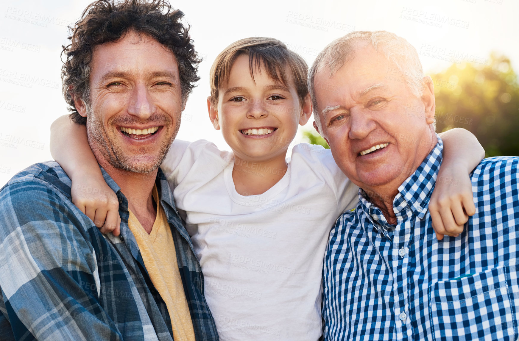Buy stock photo Portrait, father and grandfather with kid in outdoor park for happiness, support and bonding together. Lens flare, family and generations of men with smile for legacy, morning walk or weekend break