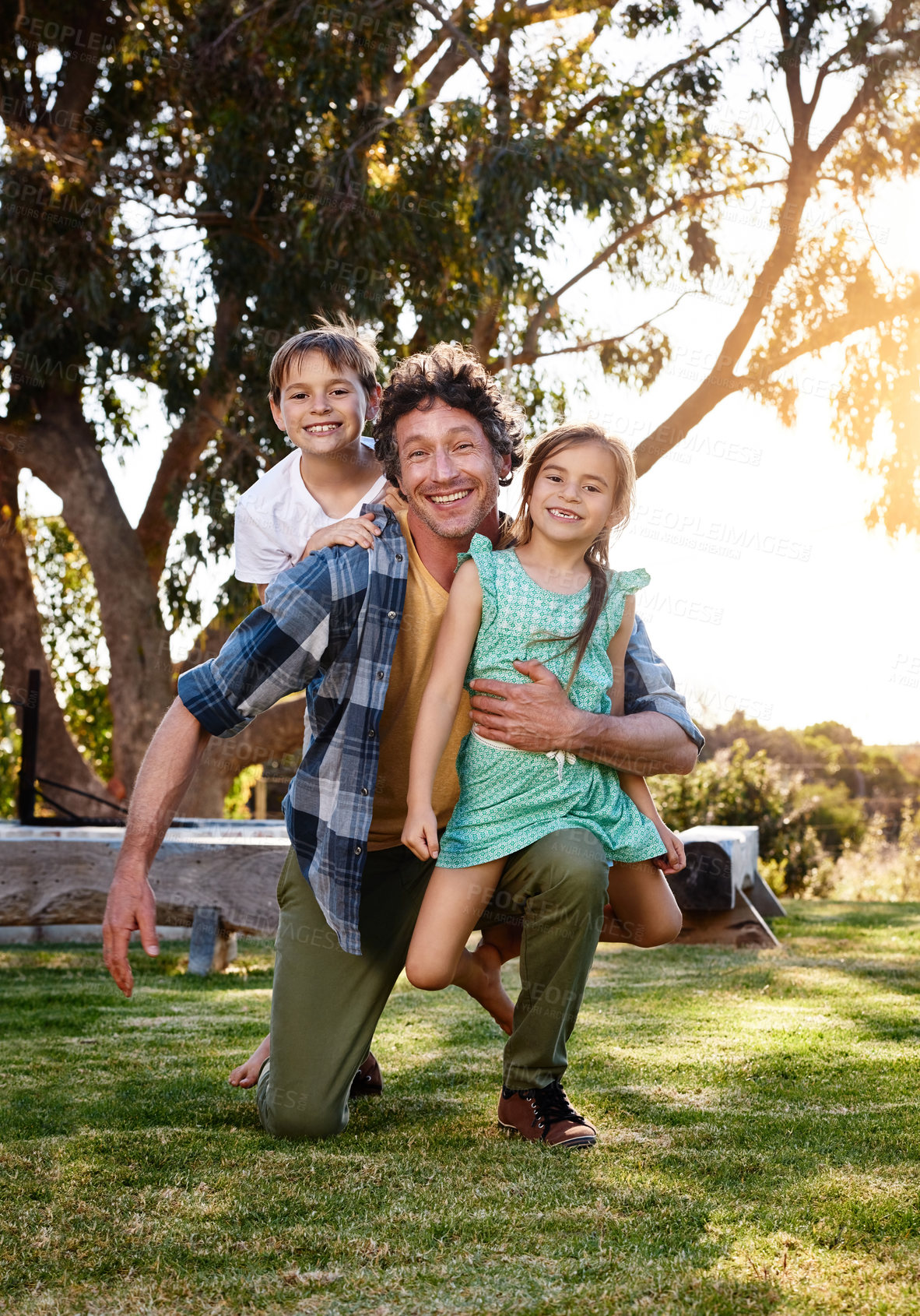 Buy stock photo Portrait, outdoor and father with children, summer and playful with happiness, bonding together and fun. Single parent, dad and daughter with son, cheerful or kids with weekend break, joy or sunshine