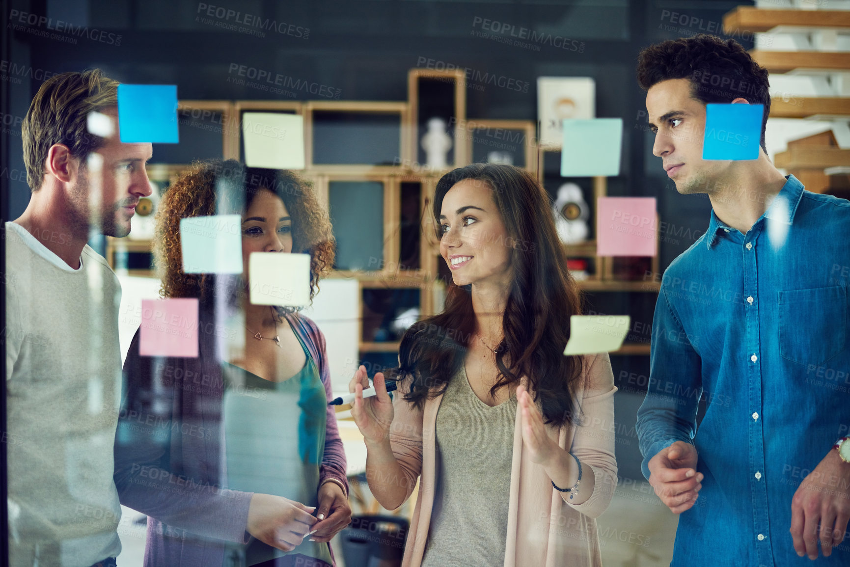 Buy stock photo Brainstorming, smile and group in office, ideas and teamwork for project, collaboration or public relations. Discussion, people and employees with sticky notes in meeting, editor or plan for campaign