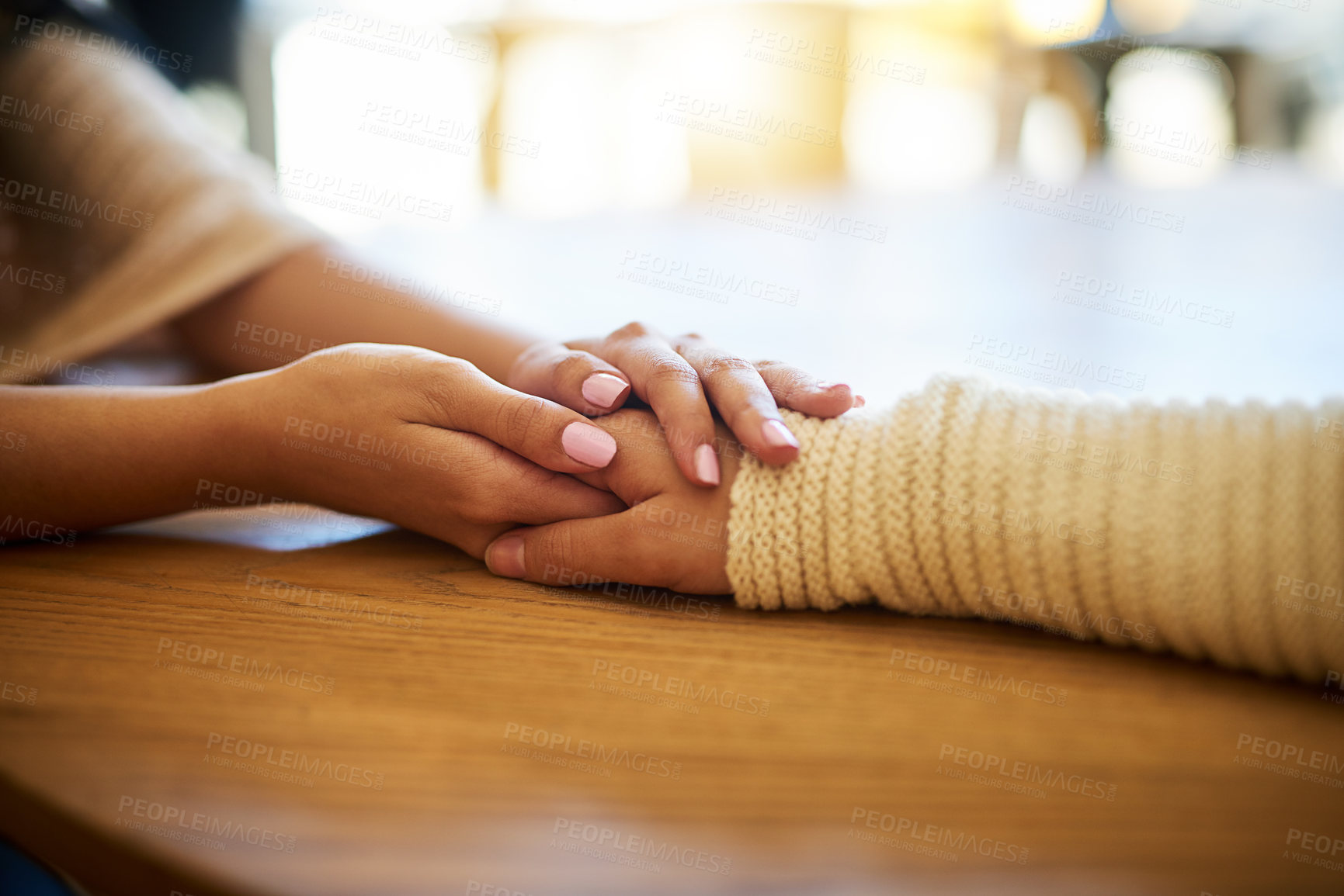 Buy stock photo Closeup shot of two people holding hands in comfort