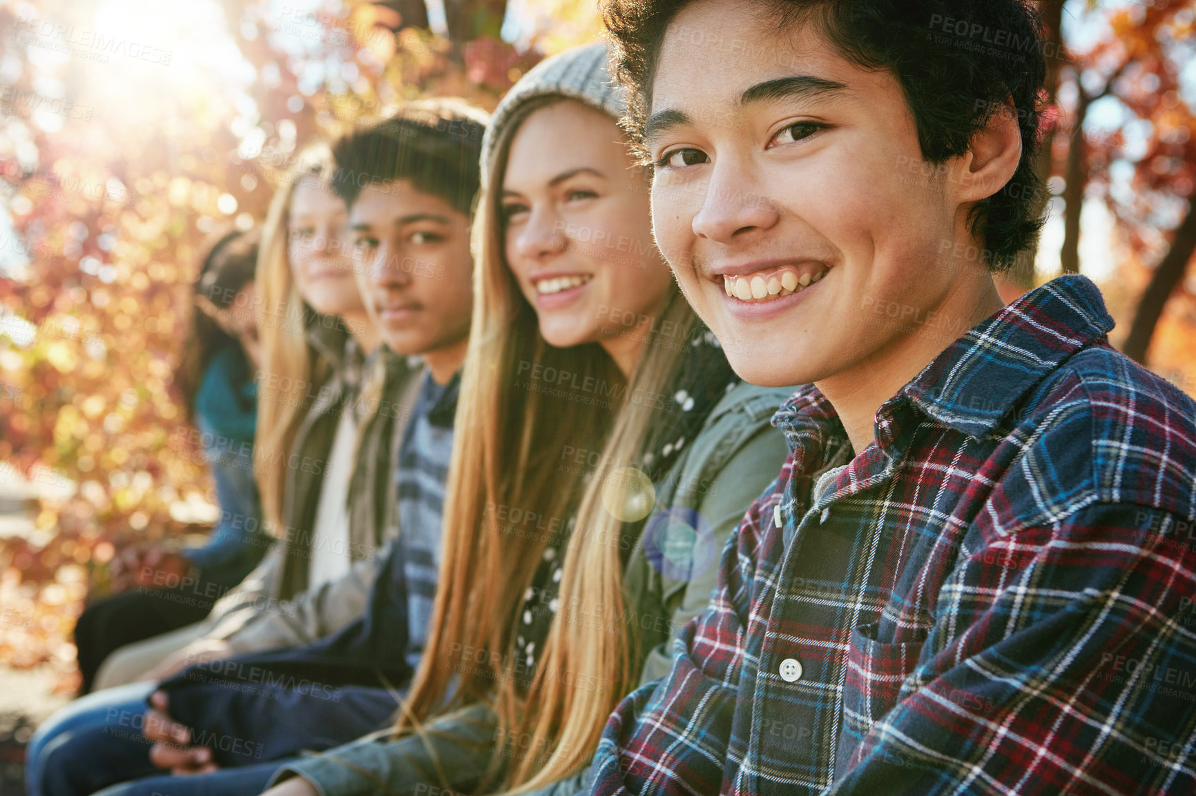 Buy stock photo Teenager, friends and portrait in park, smile and together on holiday, nature and relax by trees. Youth culture, happy boy and gen z school kids in sunshine, woods or garden for vacation in Canada