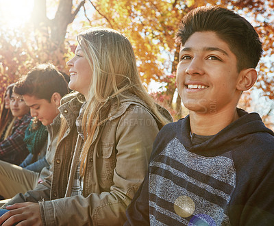 Buy stock photo Nature, travel and group of teenagers on vacation, adventure or weekend trip together in Autumn. Smile, children and young friends on holiday sitting in outdoor garden, park or field in New Zealand.