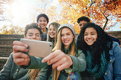 Buy stock photo Selfie, vacation or friends in park for social media, online post or profile picture in autumn or nature. Smile, boys or happy gen z girl students taking photograph on fun holiday to relax together 