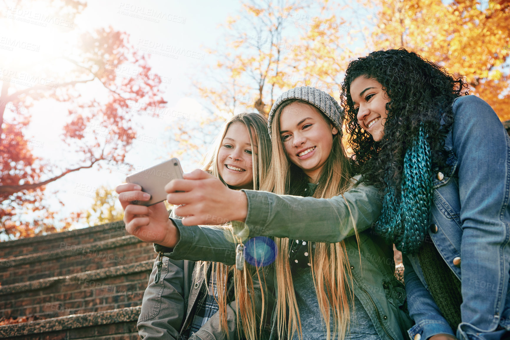 Buy stock photo Selfie, smile or girl friends in park for social media, online post or profile picture together in autumn. Relax, diversity or happy gen z girls taking photograph on a fun holiday vacation in nature 