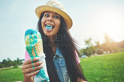 Buy stock photo Girl, crazy and tongue with ice cream cone at park sitting on bench for vanilla or bubblegum flavor. Woman, happy and gelato dessert at garden with sunshine or portrait for relax, nature and summer