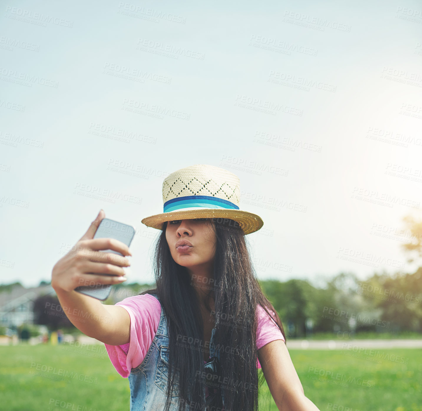 Buy stock photo Outdoor, girl and selfie with attitude in park for profile picture on social media or memory of summer vacation in California. Woman, pout and hat with photography or live blog for content creation.