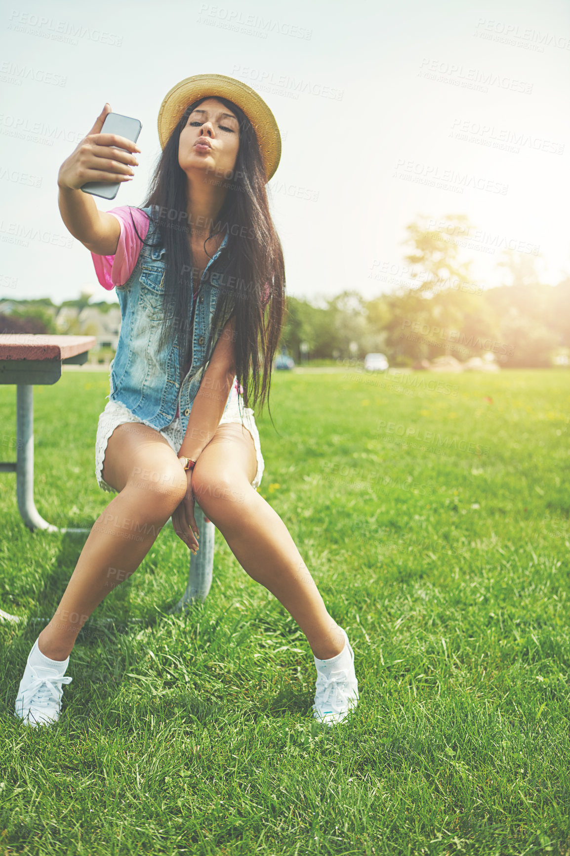 Buy stock photo Bench, girl and selfie with attitude in park for profile picture on social media or memory of summer vacation in California. Woman, pout and outdoor with photography or live blog for content creation