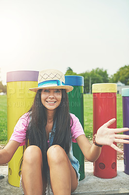 Buy stock photo Cropped portrait of an attractive young woman spending a day in the park