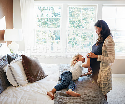 Buy stock photo Happy family bedroom, woman pregnancy or child touch stomach to check fetus, moving tummy or prenatal abdomen. Youth kid, pregnant mother and curious for baby fertility development on apartment bed