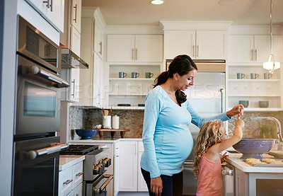 Buy stock photo Mother, girl and cookies or helping with cooking for learning, bonding and preparation in kitchen with teaching. Family, woman and daughter with baking dessert, cake and sweet snack with fun in house