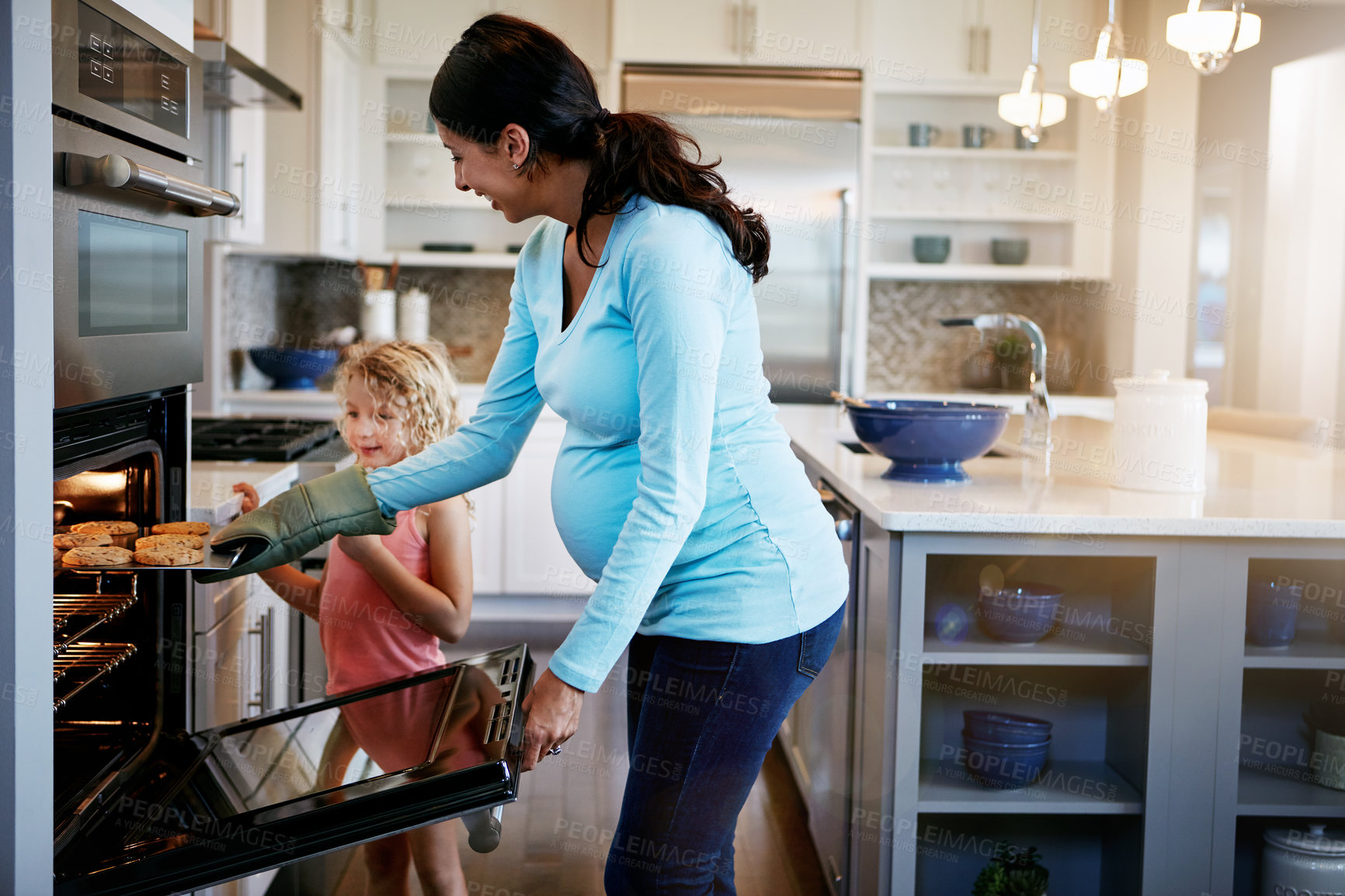 Buy stock photo Mother, daughter and cookies in stove for baking in kitchen with learning, bonding and fun in home with teaching. Family, woman and girl with cooking dessert, cake and sweet snack by oven in house