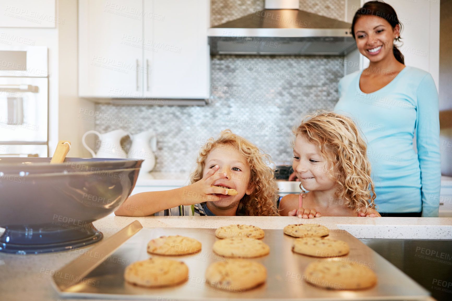 Buy stock photo Kitchen, children and pregnant woman with cookies for baking, smile and bonding in home. Pregnancy, maternity and mother with kids for biscuits, help and excited for sweet treat or dessert in house