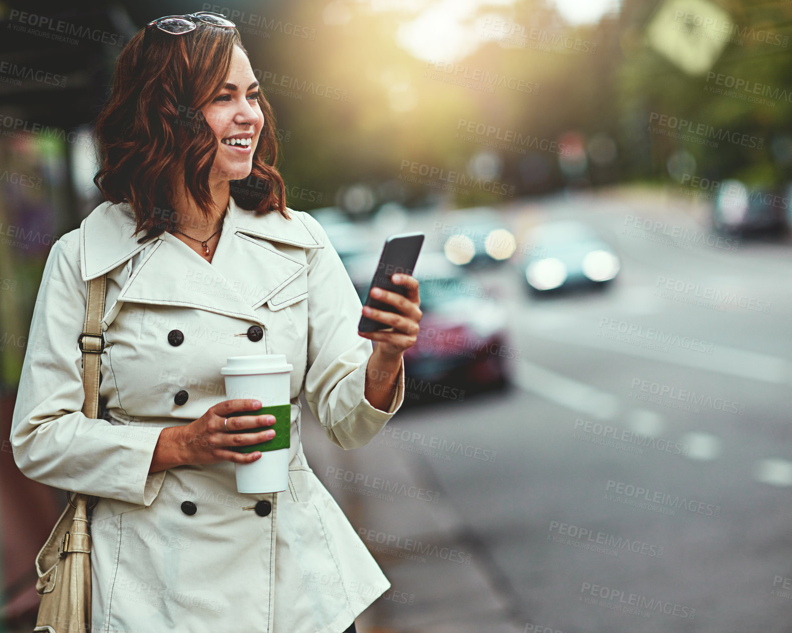 Buy stock photo Cropped shot of a happy young woman going for a walk around the city