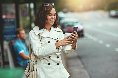 Buy stock photo Cropped shot of a happy young woman going for a walk around the city