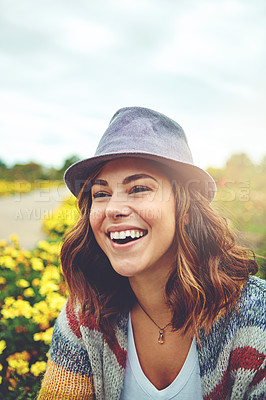 Buy stock photo Shot of an attractive young woman enjoying a spring day outdoors