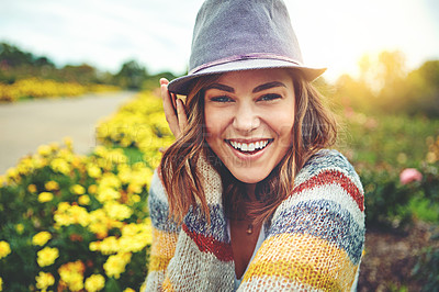 Buy stock photo Portrait of an attractive young woman enjoying a spring day outdoors