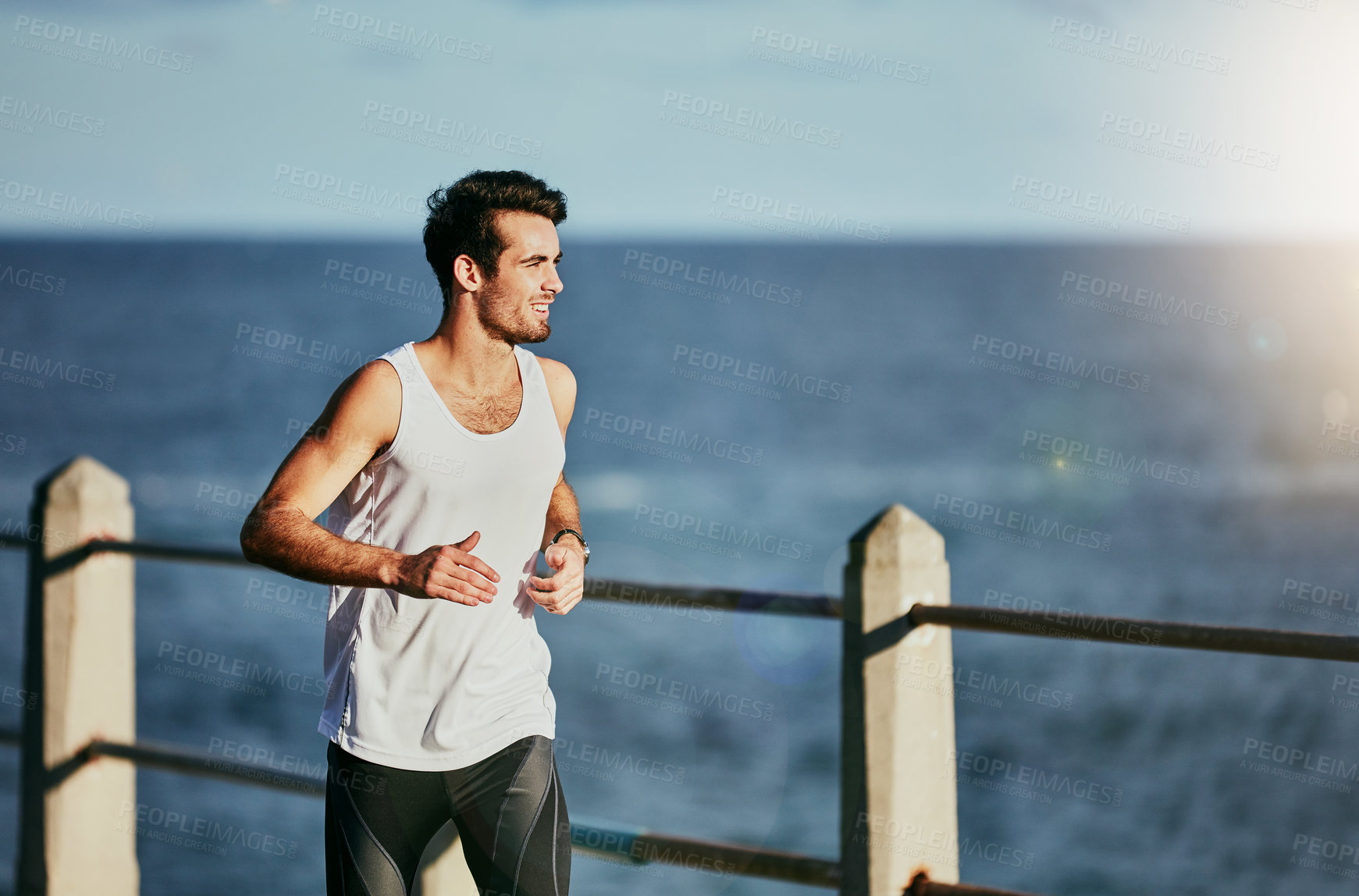 Buy stock photo Athlete, man and runner and vitality fitness, workout and body wellness for cardio exercise or sports. Marathon training, outdoor and performance for speed and jog, challenge and practice and ocean