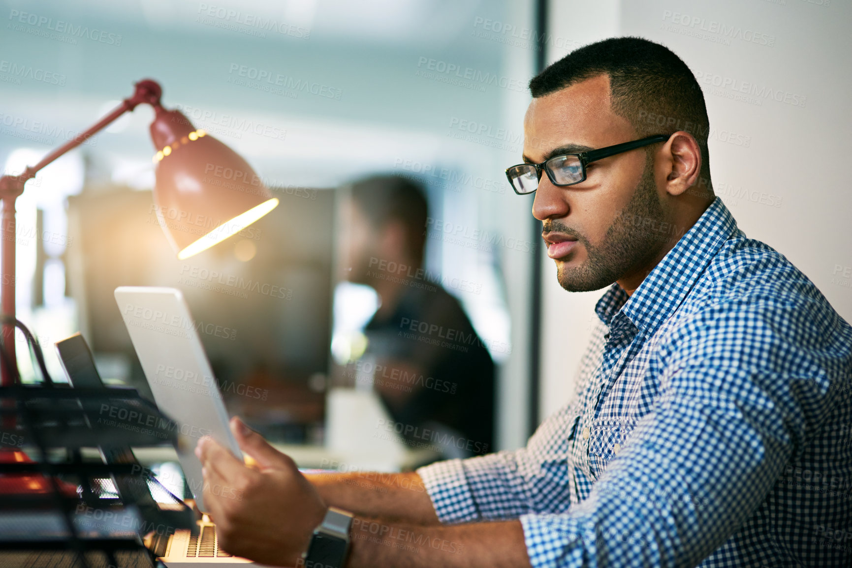 Buy stock photo Man, reading or tablet in office with glasses for career, social media management for company. Professional, creative or male person with ebook for research with email marketing, happy for post