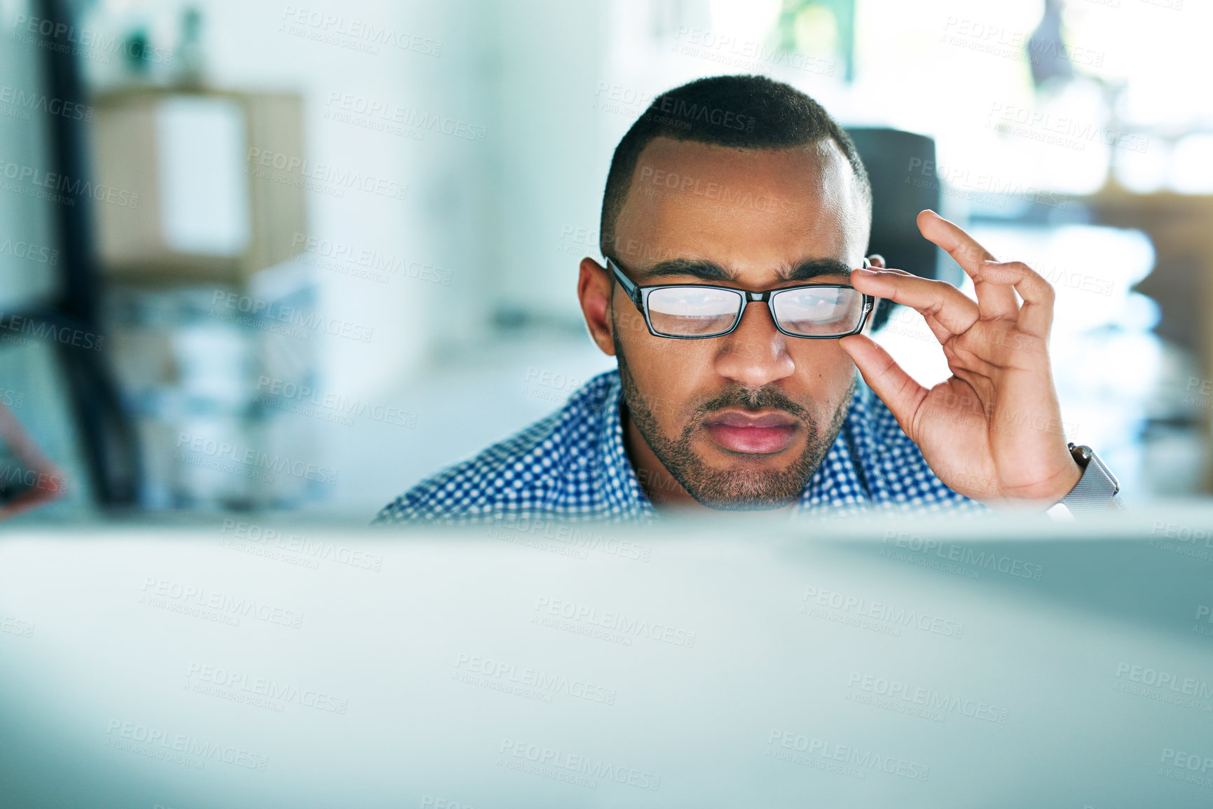 Buy stock photo Black man, thinking and computer in office with glasses, research or reading for startup company. Businessman, idea or tech for networking with review, problem solving or brainstorming in workplace