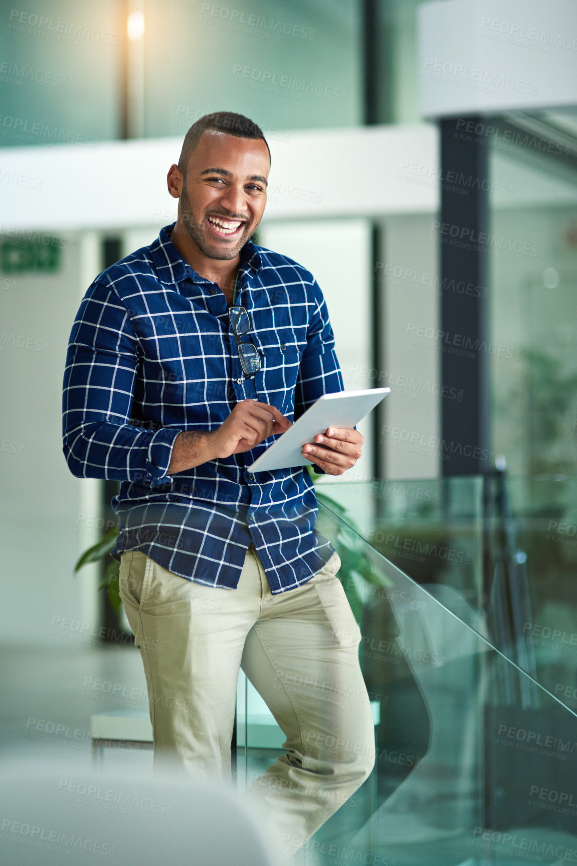 Buy stock photo Black man, portrait and tablet in office with smile, career and social media management for company. Male person, creative and happy with walk for reading with email marketing, notification and post