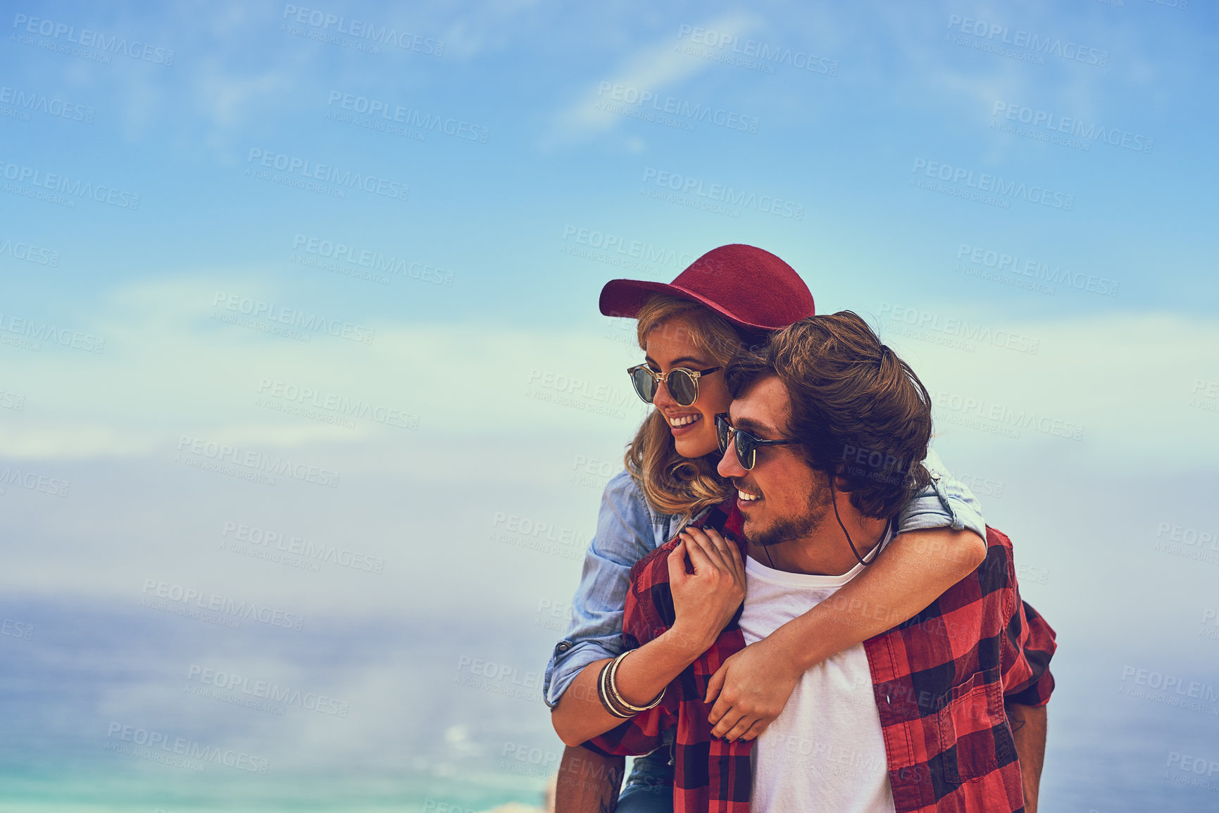 Buy stock photo Couple, happy and piggyback holiday or sky background, smile and relationship bonding on weekend break with love. Summer, commitment and trust outdoor on nature date together, support and people