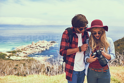 Buy stock photo Couple, people and smile on hill with camera for photography with fun, love and bonding in outdoor. Relationship, care and happy for holiday or vacation with adventure or travel for break in London