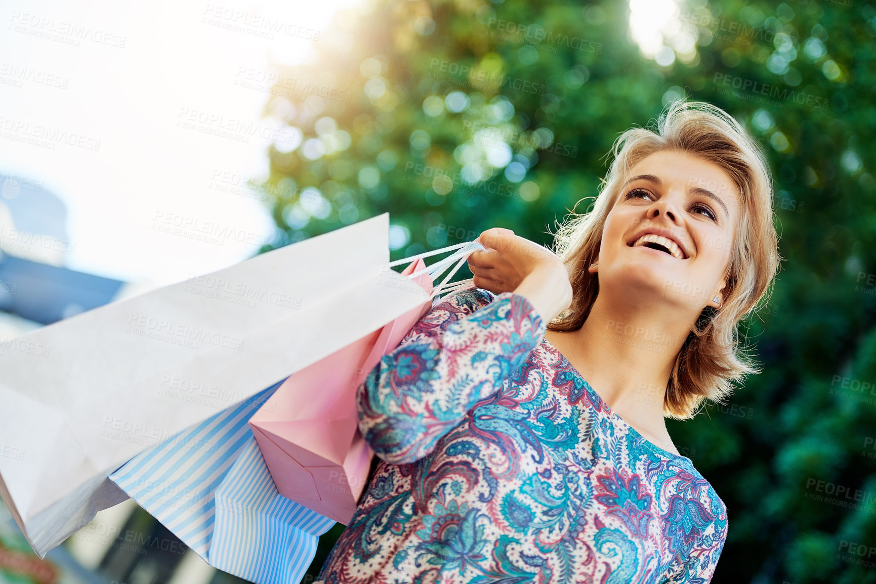 Buy stock photo Shopping, woman and thinking in city for retail, fashion and happiness for sale in street. Customer, bags and female person on sidewalk and sunshine or smile for idea, boutique or discount in Miami