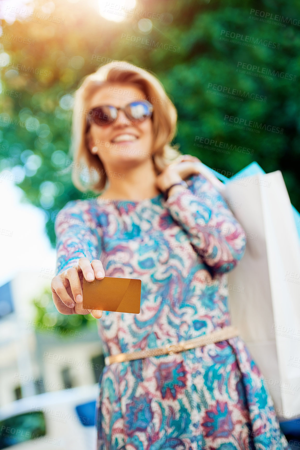 Buy stock photo Shopping bag, woman and credit card for discount, sale or offer of payment or purchase in city. Portrait of customer with money or banking, finance and saving for fashion, style and clothes or luxury