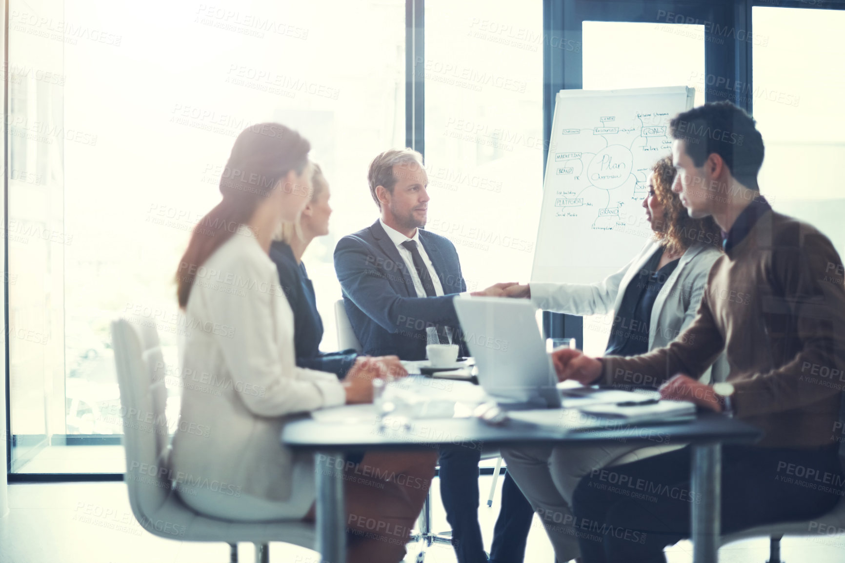 Buy stock photo Workshop, handshake and group of business people at presentation for b2b negotiation planning. Meeting, collaboration and team shaking hands in office for deal ideas, agreement and congratulations