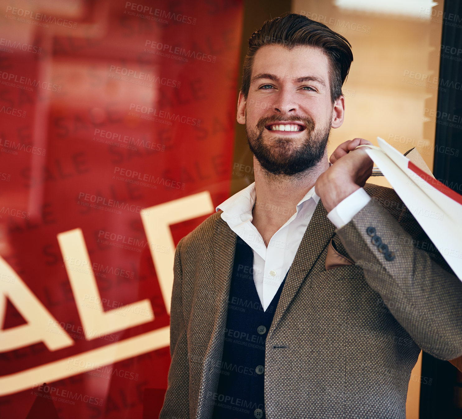 Buy stock photo Cropped shot of a young man out shopping
