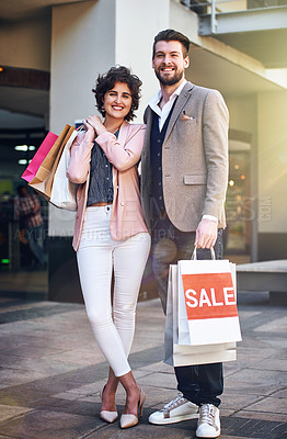 Buy stock photo Shopping, bag and portrait of couple in city for clothing sale, discount deal and store promotion. Fashion, boutique and happy man and woman check products for bonding, travel and tourism in mall