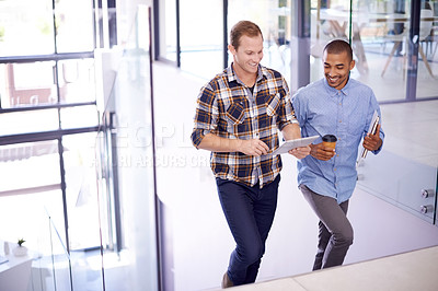 Buy stock photo Men, office and happy with tablet on stairs for online research, ideas and creativity as graphic designers. People, teamwork and together on internet for networking, communication and discussion