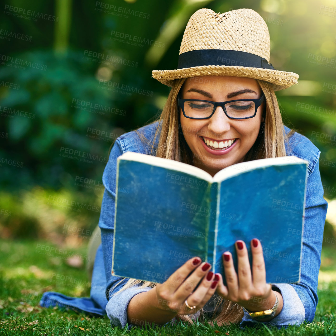Buy stock photo Park, grass and girl with book for reading, learning and knowledge with smile outdoor. Nature, female student and novel for entertainment, romance and English literature for language improvement