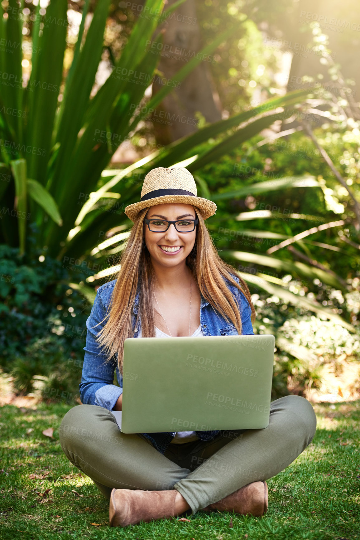 Buy stock photo University student, portrait and woman with laptop in park on campus for relax, education or working on assignment. College, typing and person with computer for school report, studying or garden