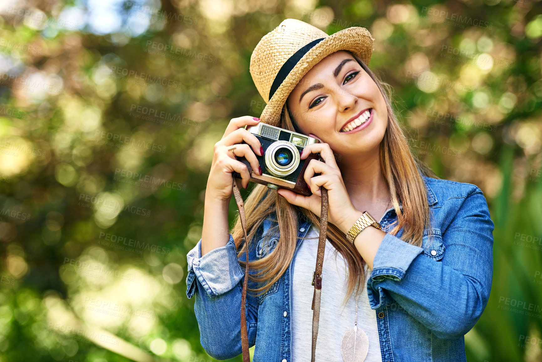 Buy stock photo Outdoor, woman and portrait with vintage camera for photography on vacation, adventure and holiday in Germany. Female person, cameraman or photographer for capture, focus and create memories by bokeh