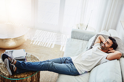 Buy stock photo Home, stretch and man on a couch, relax and freedom on a weekend break, thinking and calm in the living room. Male person, happiness and happy guy on a sofa, lounge and smile with wellness and dream