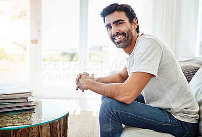 Buy stock photo Portrait of a man relaxing on the sofa at home