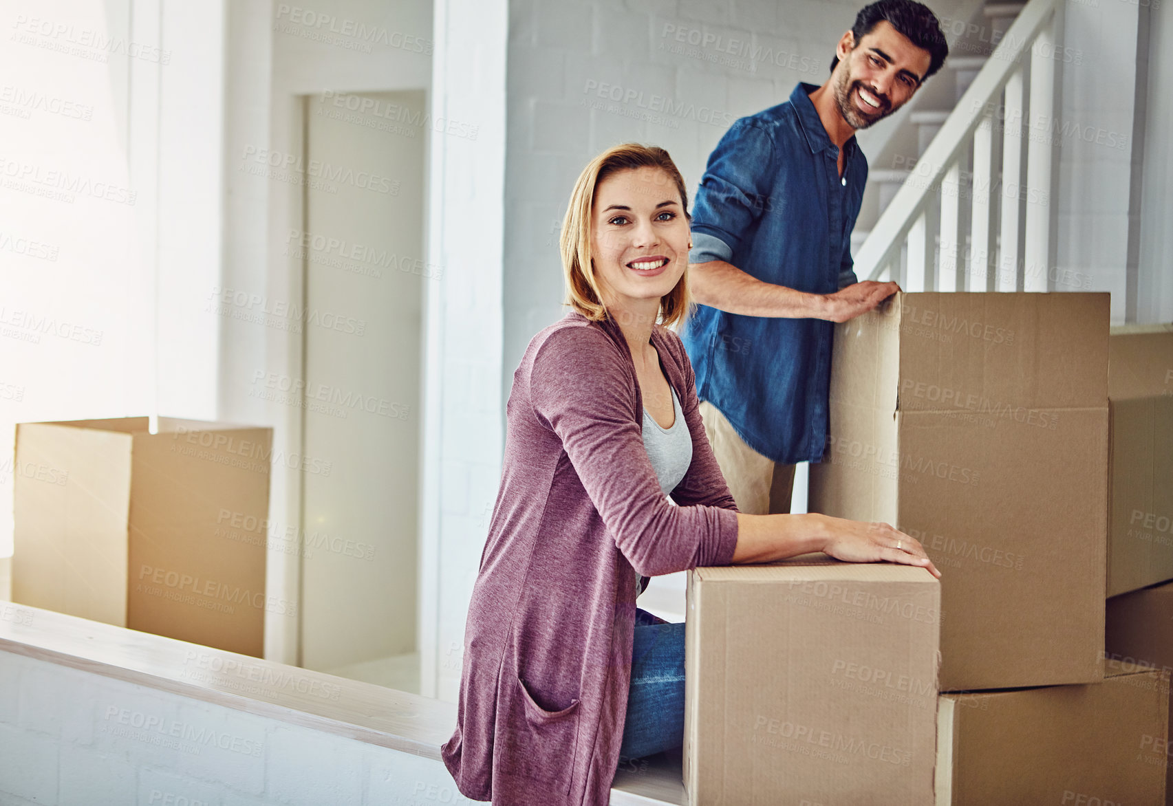 Buy stock photo Portrait of a couple moving into their new home