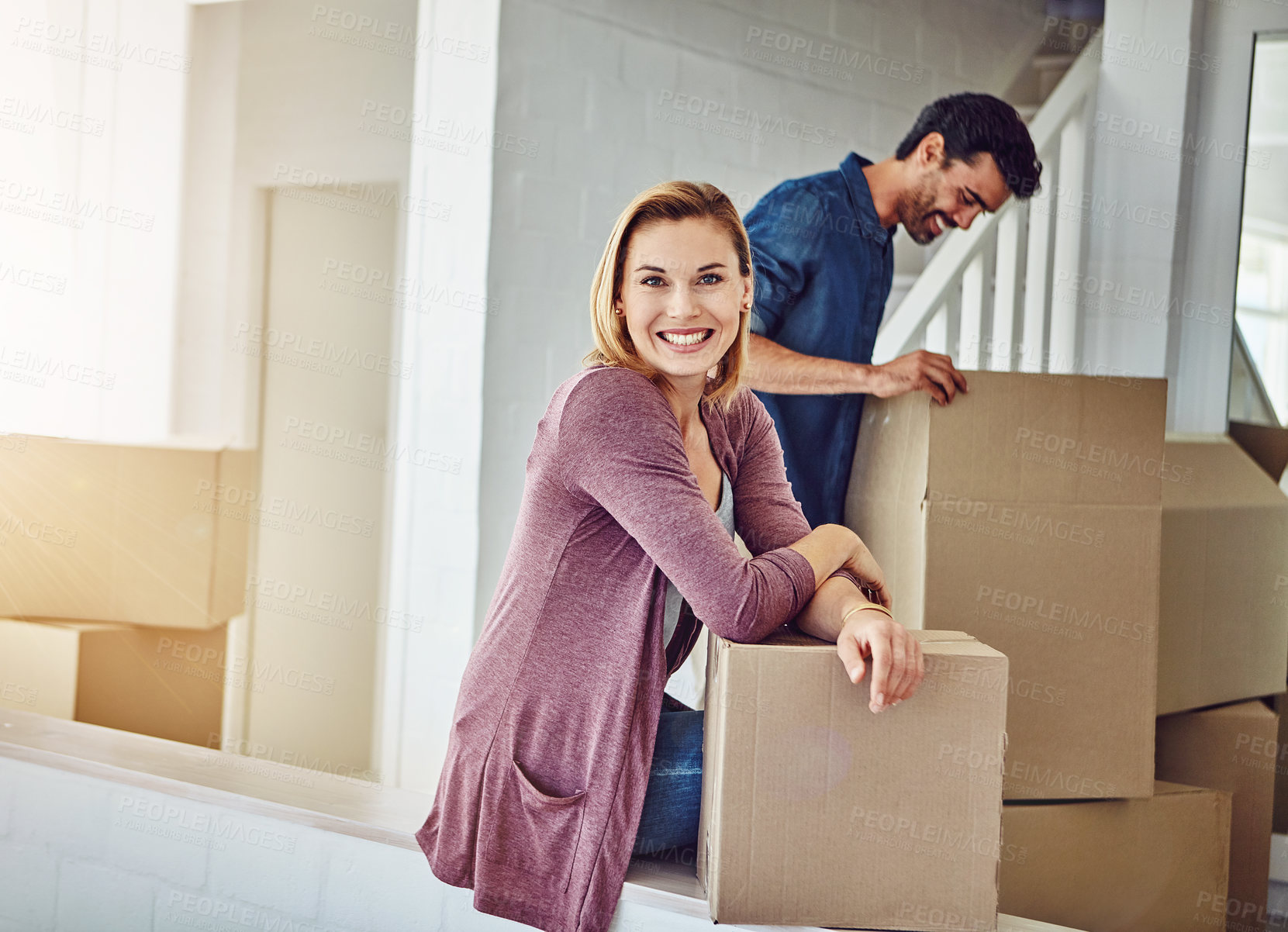 Buy stock photo Portrait of a couple moving into their new home