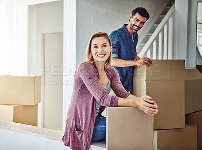 Buy stock photo Portrait of a couple moving into their new home