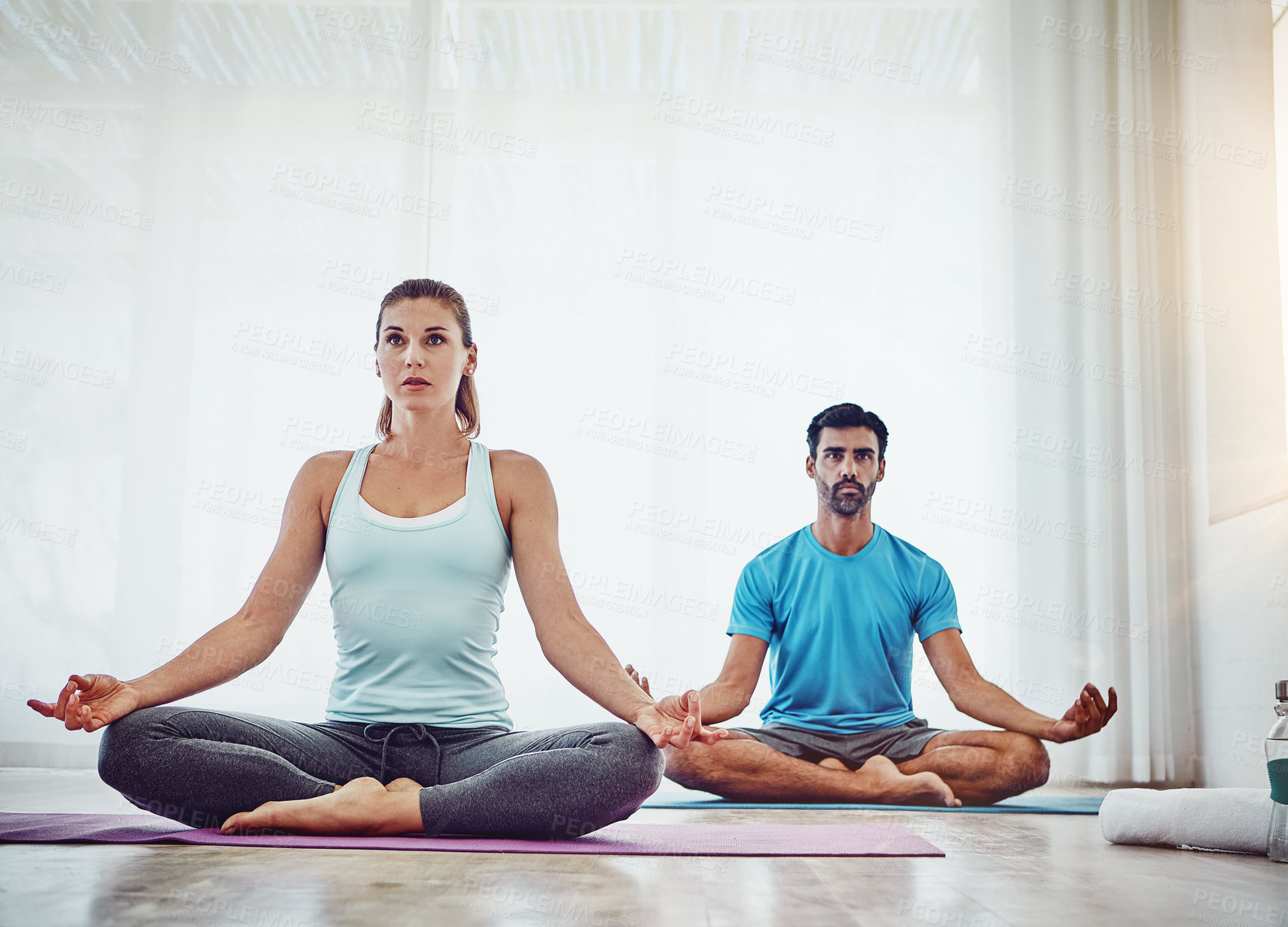 Buy stock photo Spiritual, meditation and couple in home for healing, wellness and workout in living room. Fitness, mental health and yogi woman with man for pilates exercise, balanced chi or lotus energy or aura
