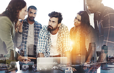 Buy stock photo Digitally enhanced shot of a group of colleagues gathered around a laptop in the office