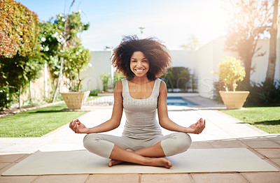 Buy stock photo Full length portrait of a sporty young woman practicing yoga outdoors