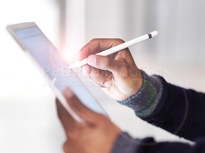 Buy stock photo Cropped closeup shot of an unrecognizable man using a digital tablet and pen