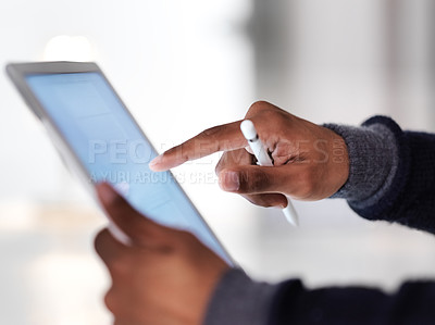 Buy stock photo Cropped closeup shot of an unrecognizable man using a digital tablet and pen