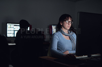 Buy stock photo Dark, office and woman at computer for data analysis, online programming and cybersecurity. Software, research and web developer in coworking space for cyber hacking, firewall and malware coding 