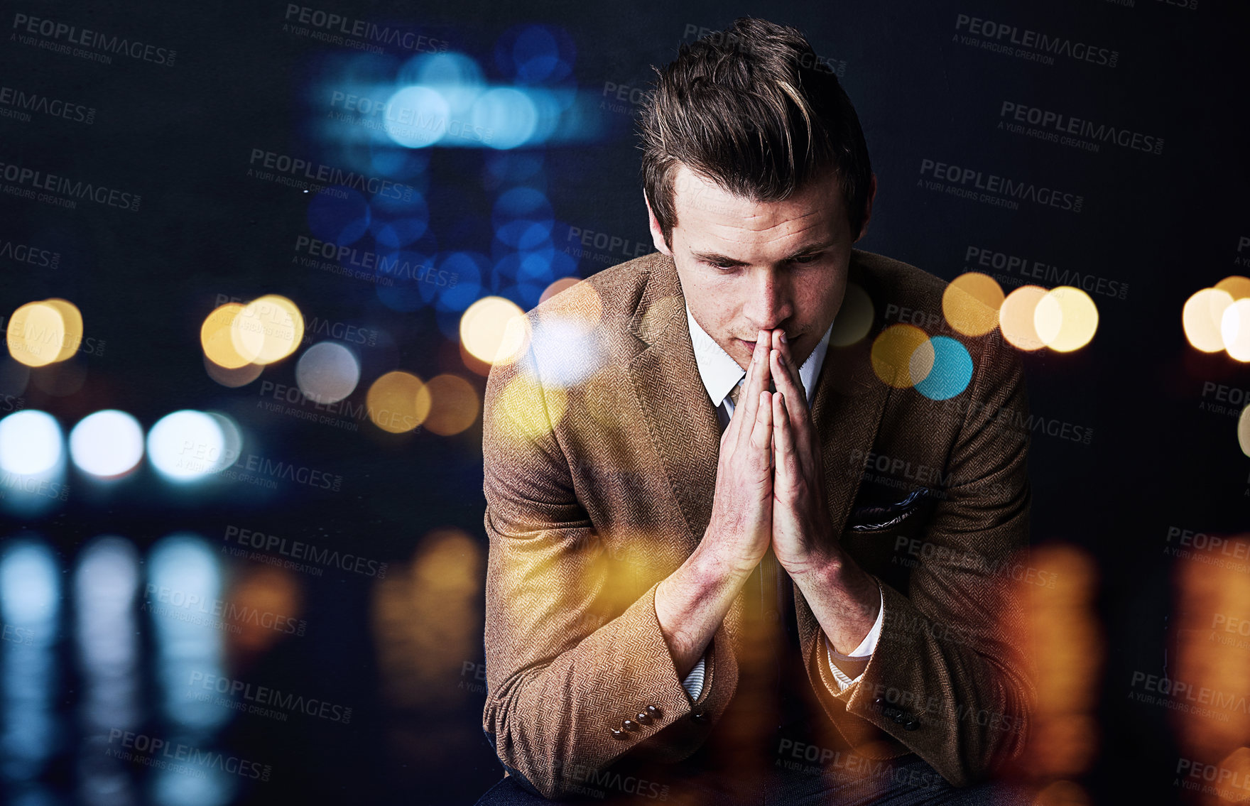 Buy stock photo Shot of a focussed young businessman superimposed over a defocussed cityscape