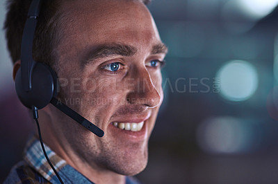 Buy stock photo Call center agent smiling, looking happy and friendly while working in an office alone at work. Face of a positive, thinking and professional customer service agent, helpdesk operator or employee