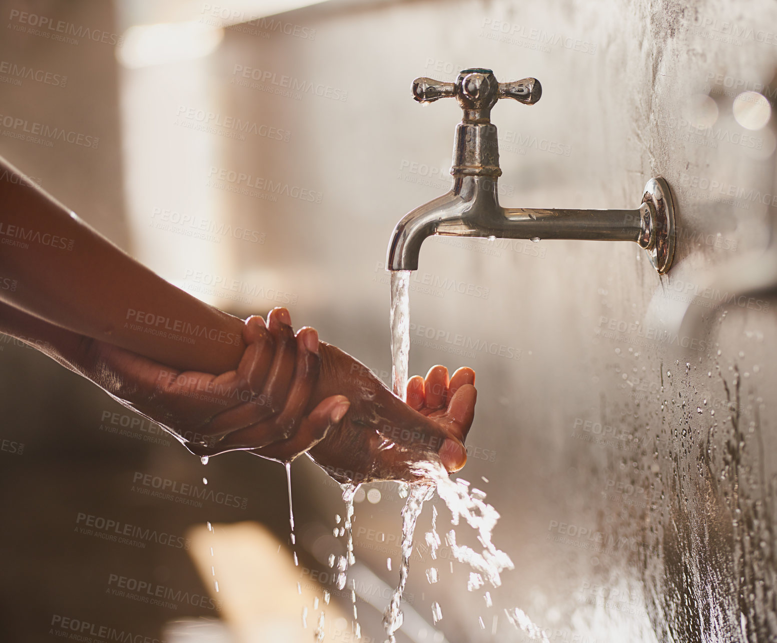 Buy stock photo Cropped closeup shot of a woman washing her hands under a faucet